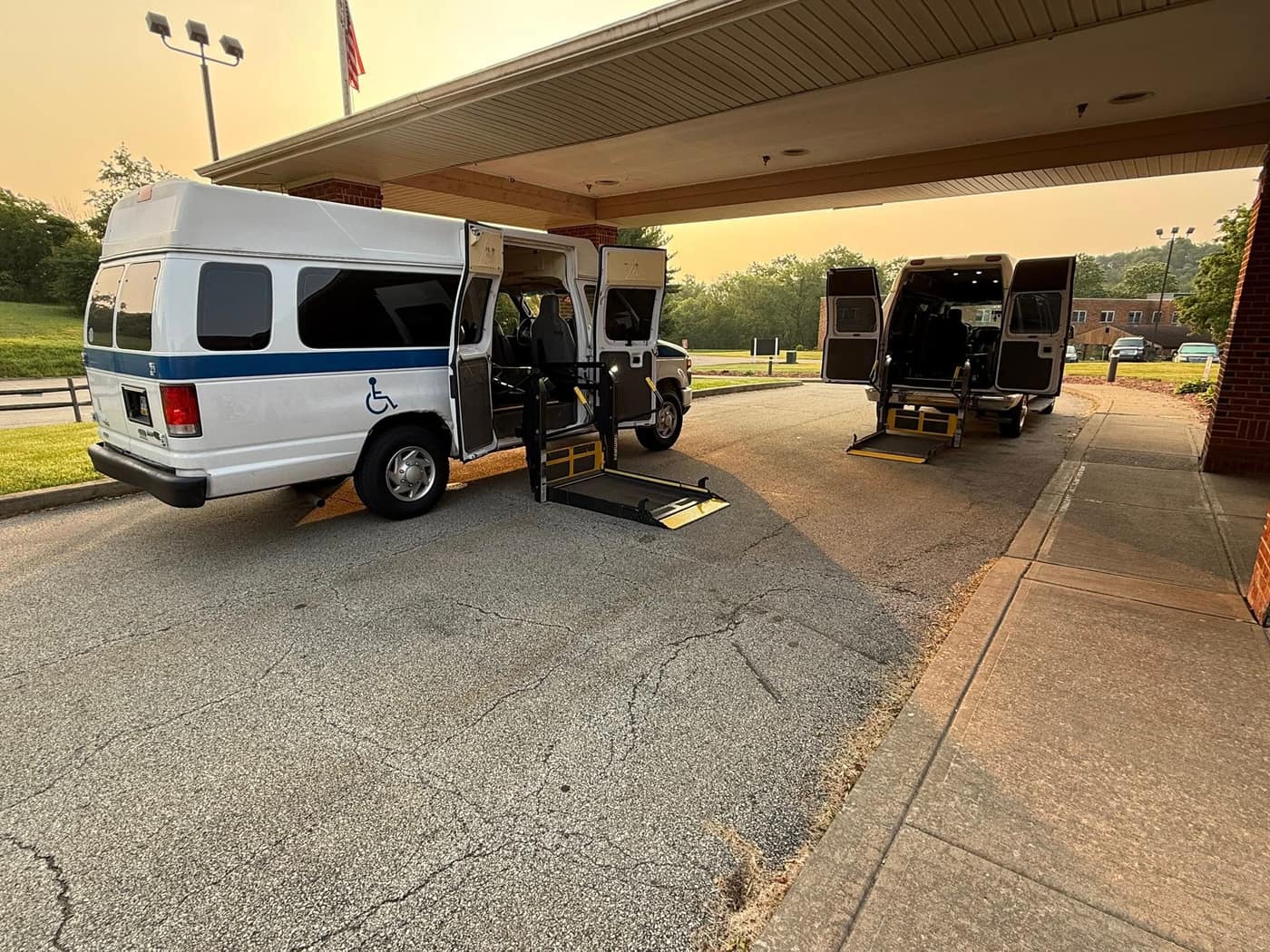 ATS vans with wheelchair ramps fully deployed