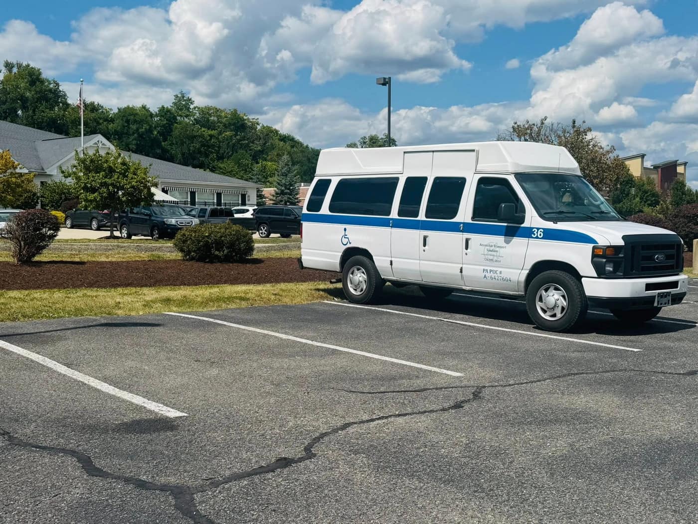 ATS van number 36 parked on a sunny day
